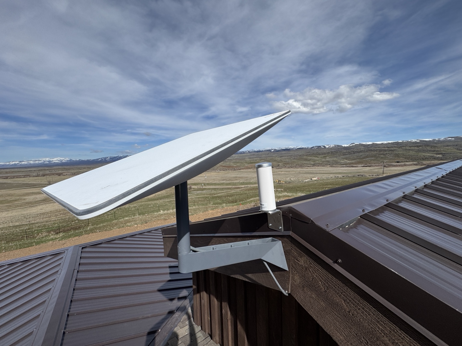 Starlink satellite internet dish installed on a commercial rooftop in Idaho