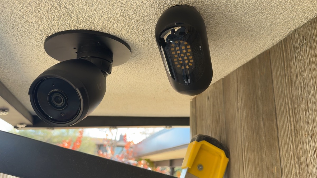 An outdoor security camera and motion sensor installed at the Boise office.